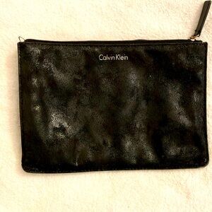 Calvin Klein purse or make up bag. Black with slight glitter.
